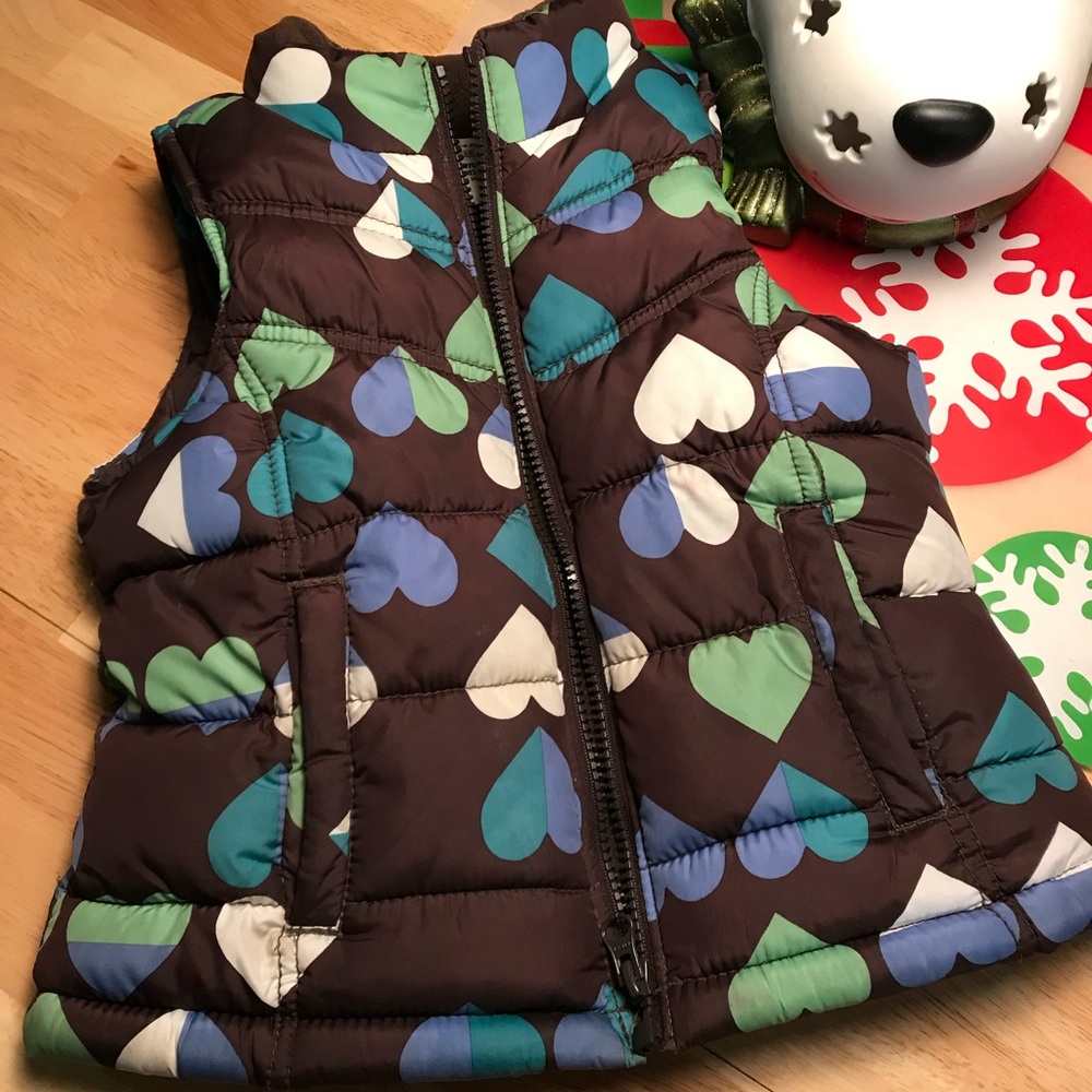 Girls fleece lined puffy vest.