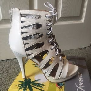 White caged lace up heels