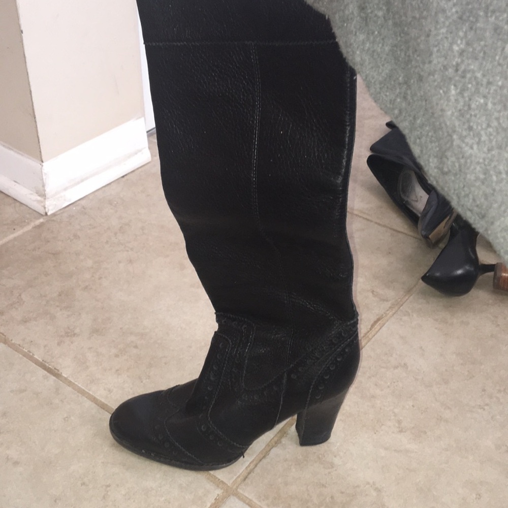 Knee high black leather boots