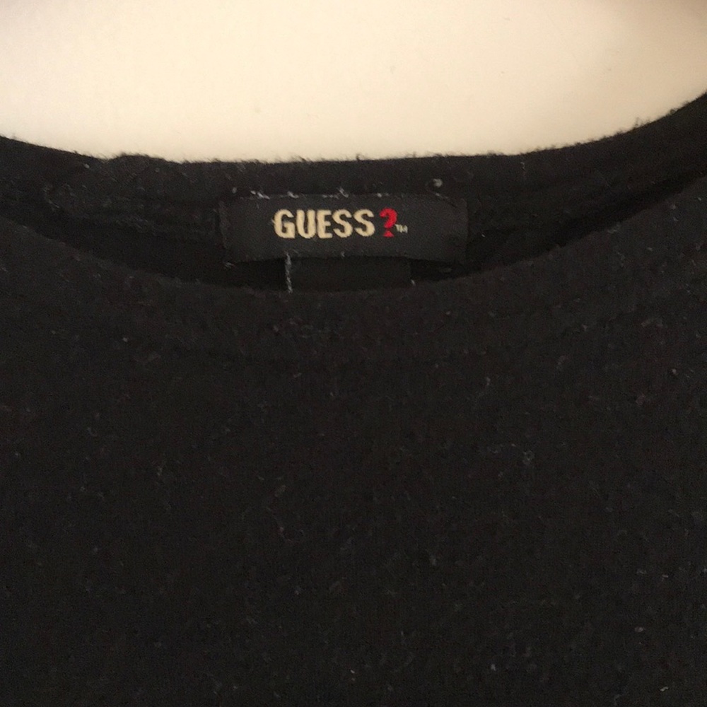 Black dress with shoulder and back cutouts