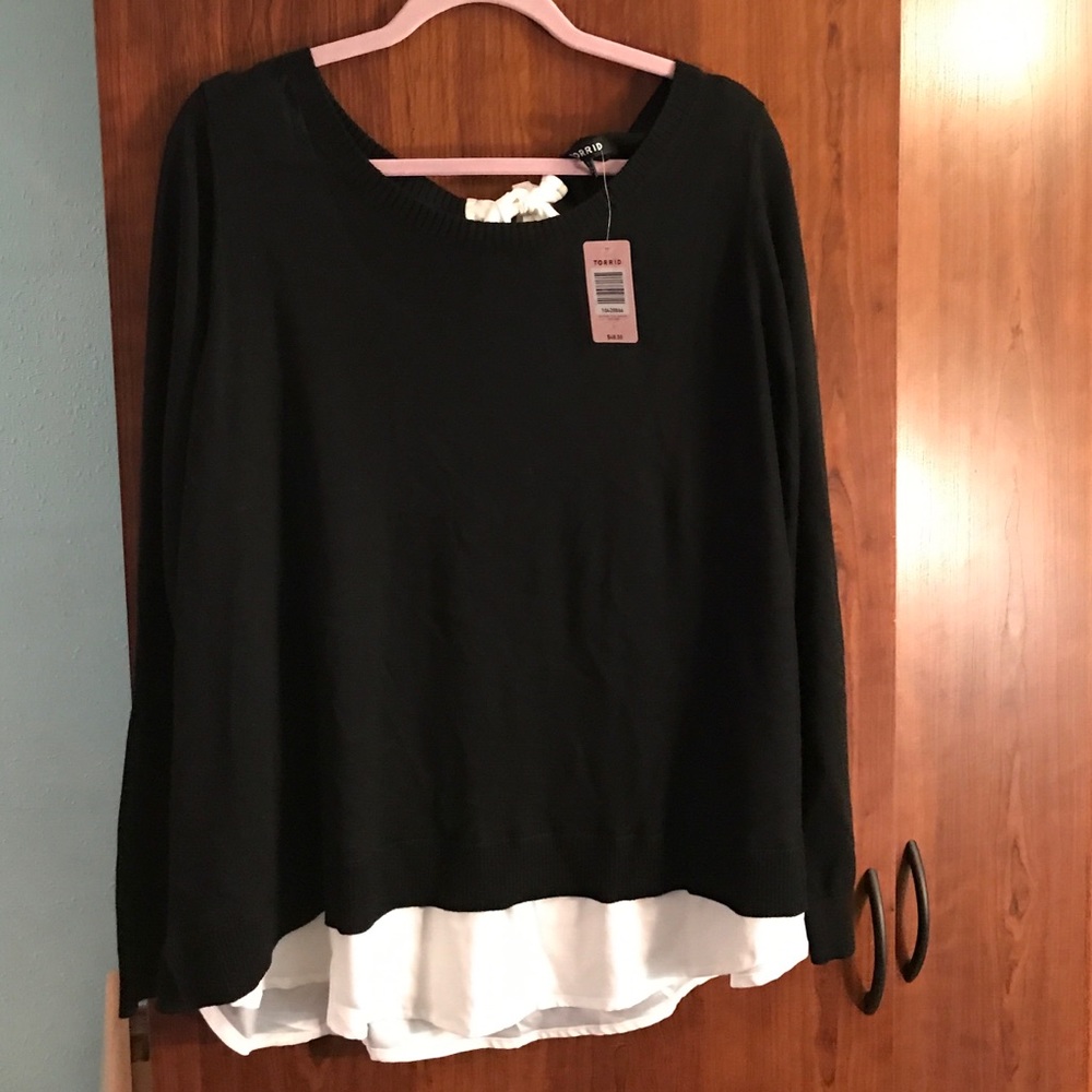 NWT. Black/ivory sweater w/ back tie detail