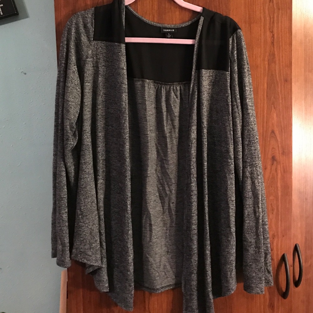 Dark Heather grey and black sweater.