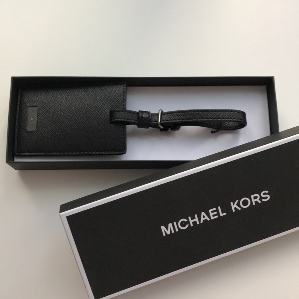 Michael Kors black luggage tag - never used in box