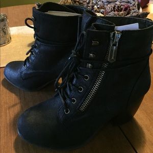 Never worn Black heeled bootie
