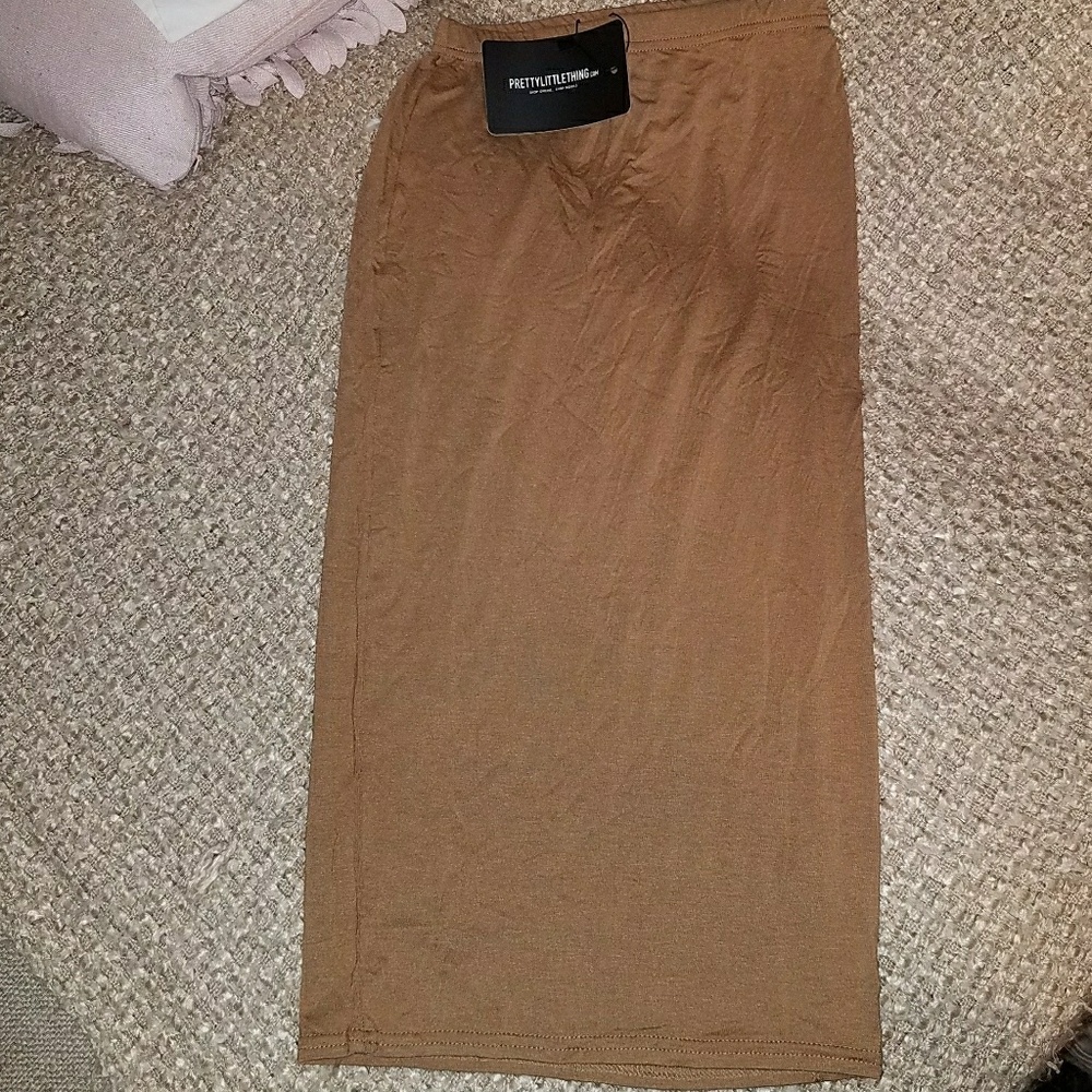 Pretty little thing size 6 fits like a xs . NWT