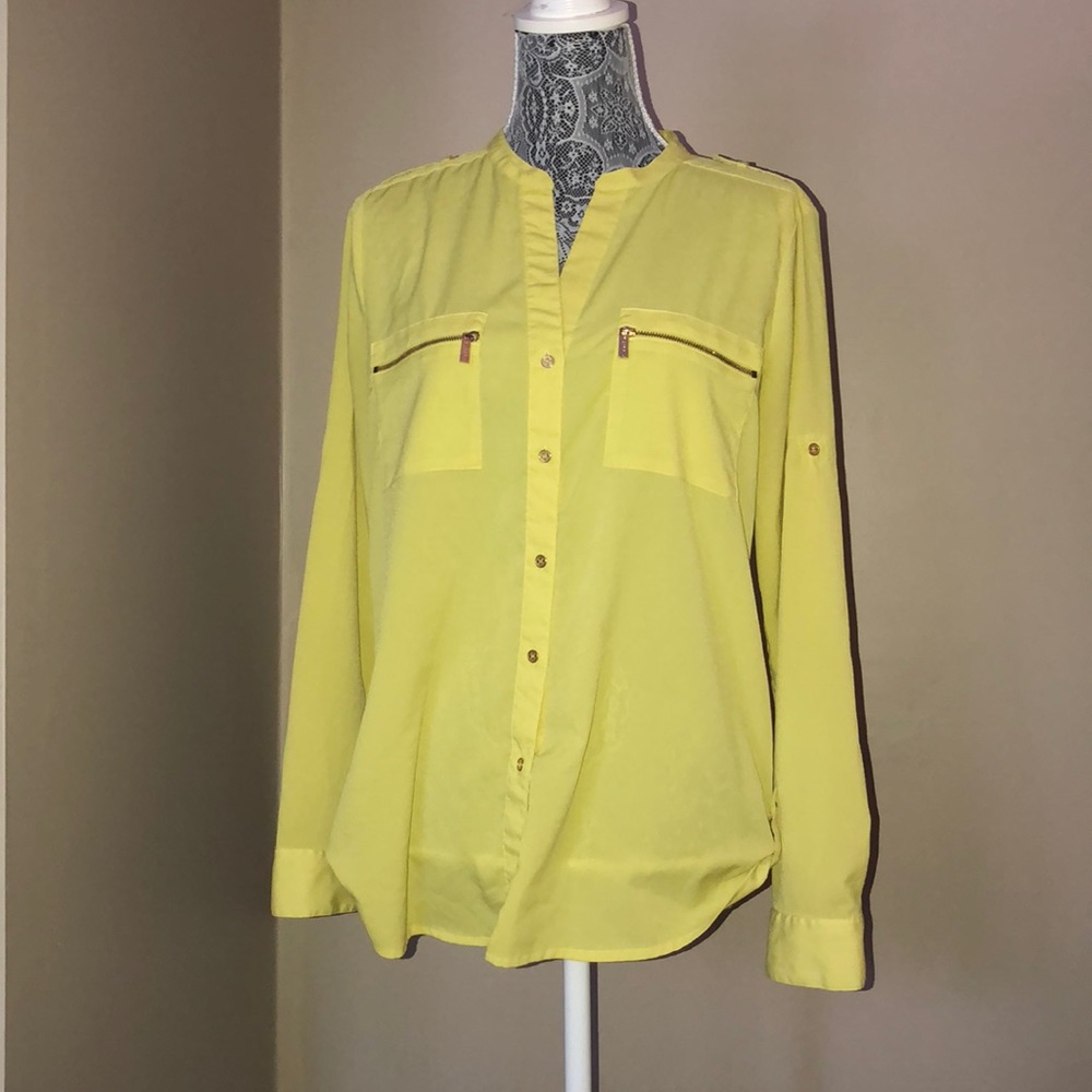 Woman’s Calvin Klein yellow blouse