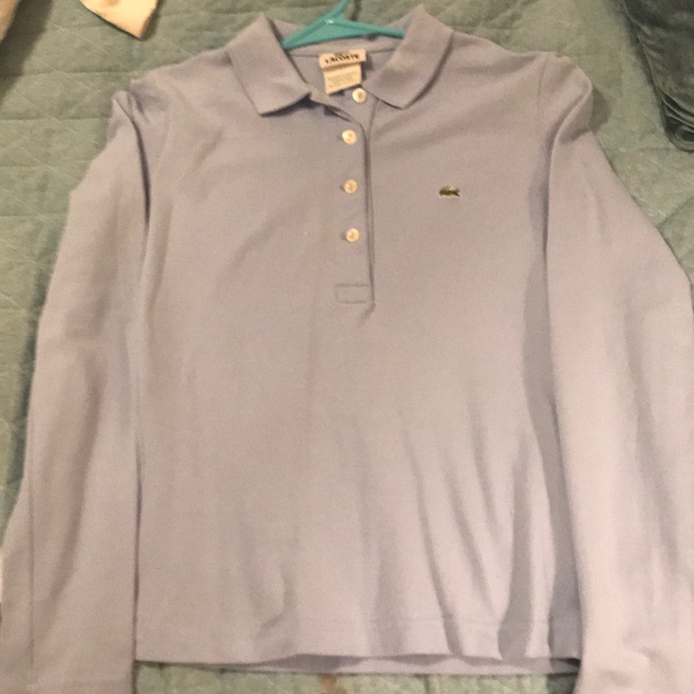 Lacoste Women’s polo shirt . Size 36. Pale blue.
