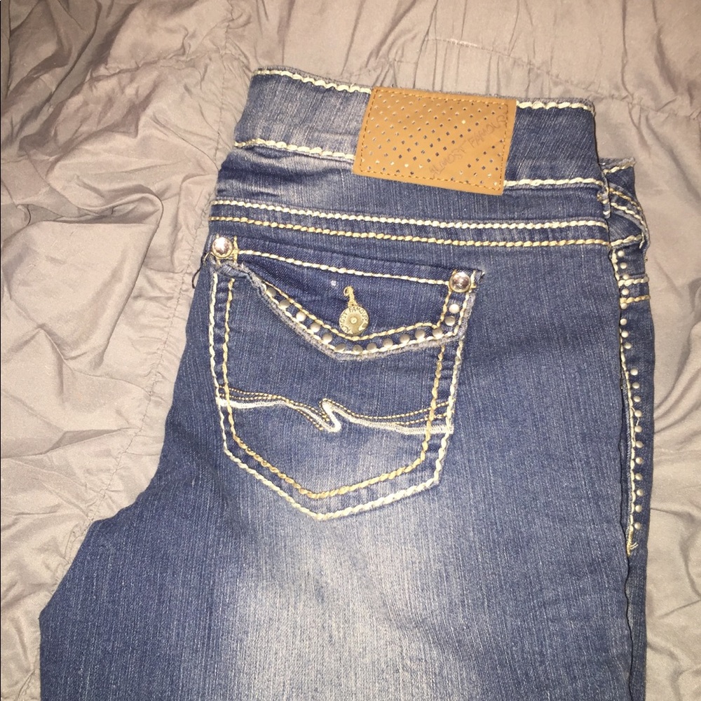 Almost famous jeans never worn size 15
