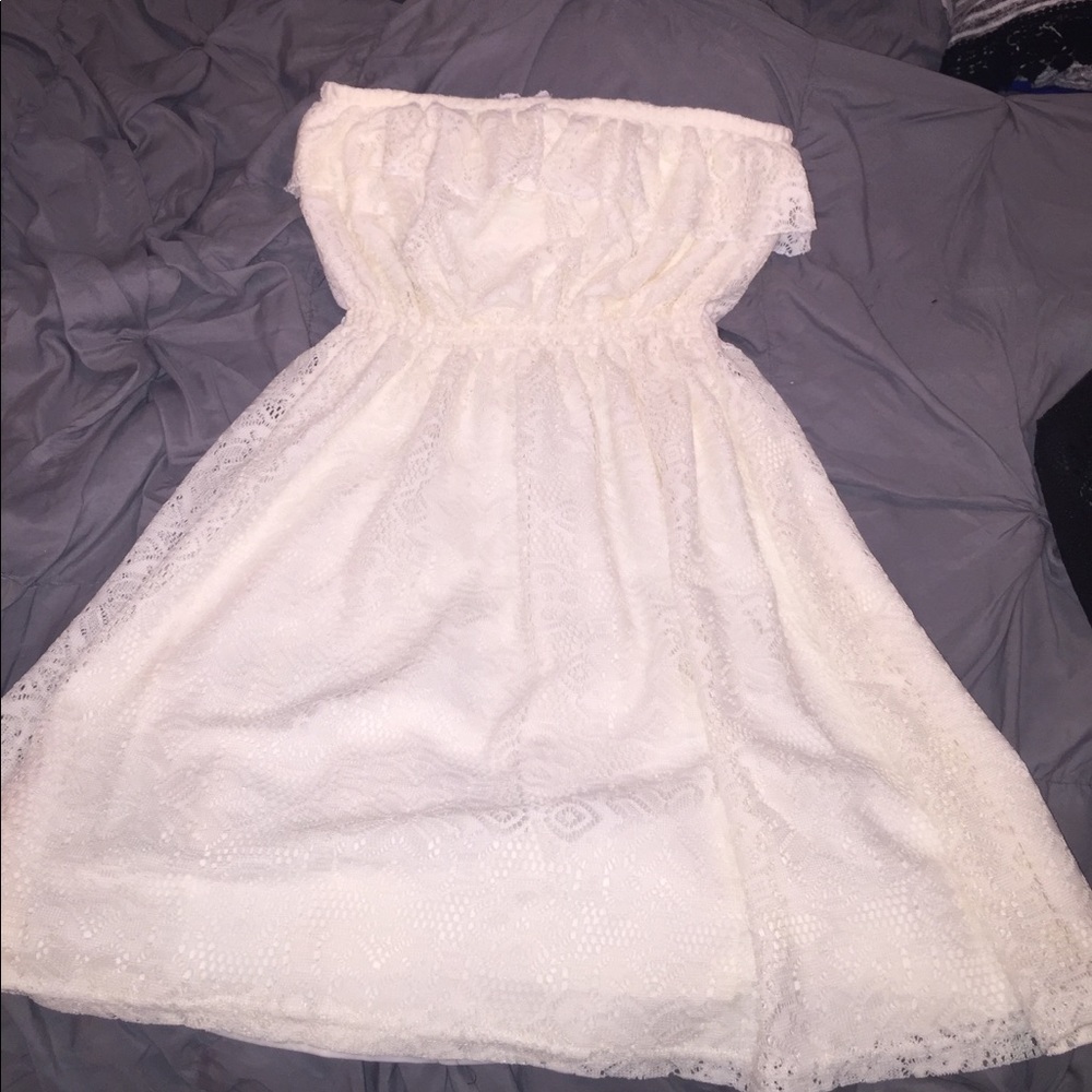 Cream colored strapless lace dress