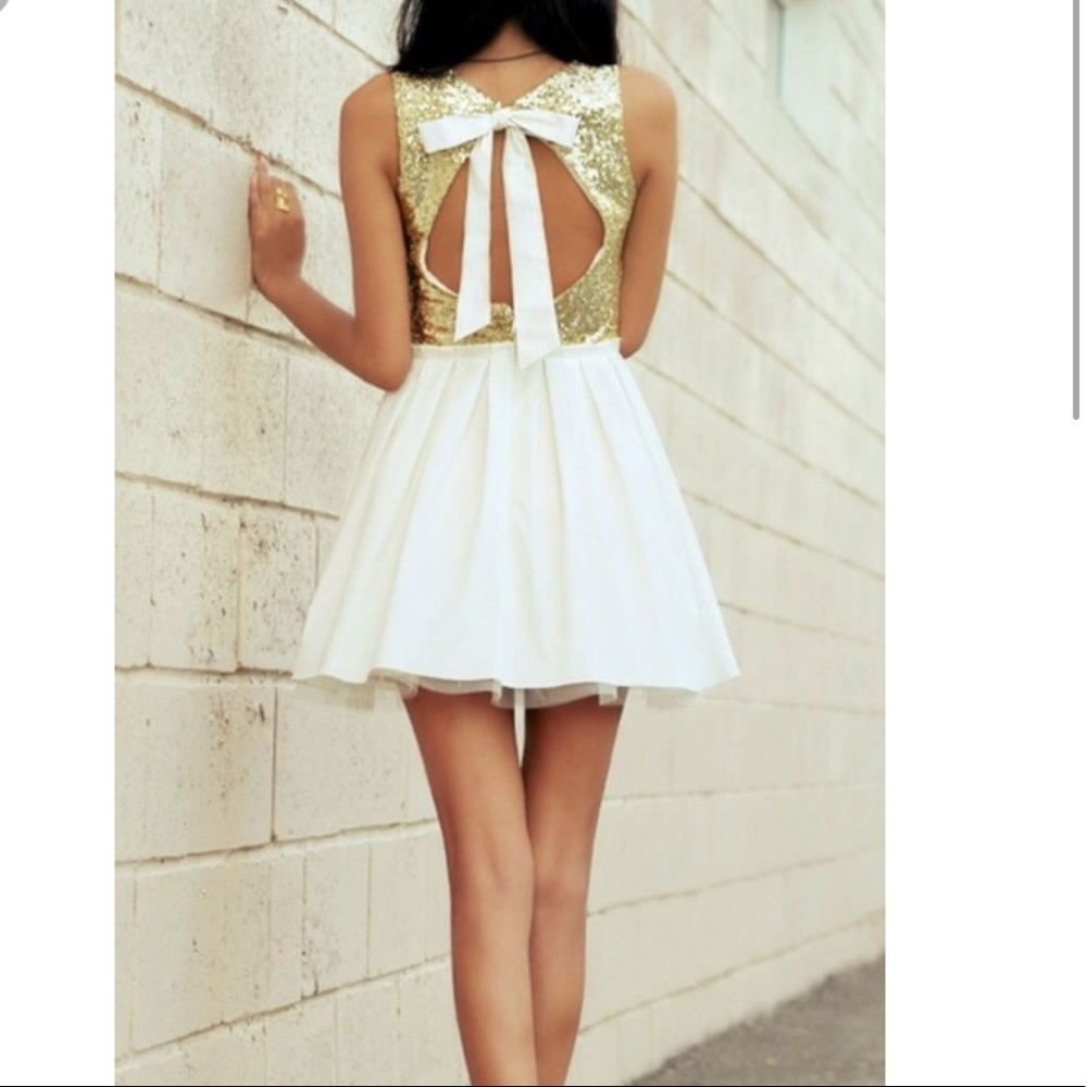 B. Darlin Gold and White Sequin Dress