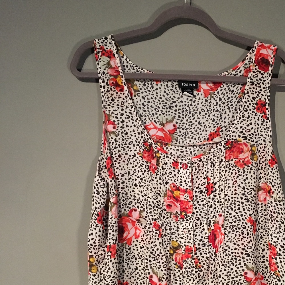 Sheer sleeveless blouse by Torrid